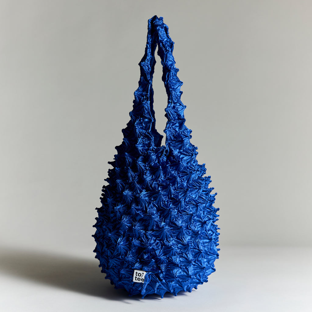 totee ブルー 絞り加工 エコバッグ 側面｜日本デザインの折りたたみトートバッグ